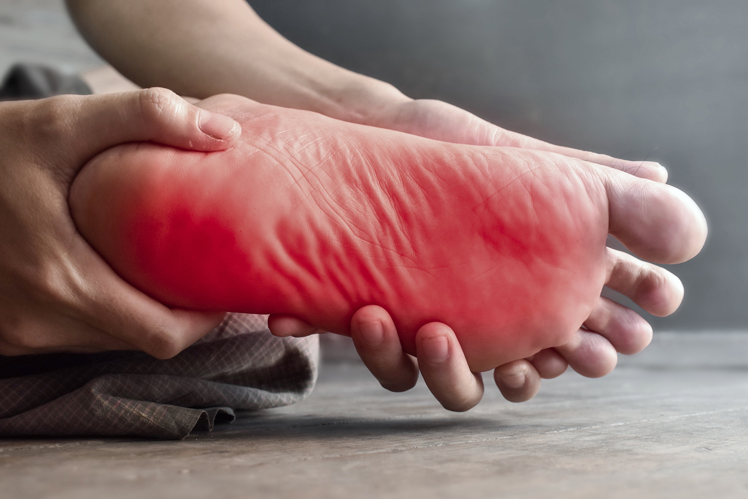 Managing Neuropathies a foot writhing in pain and discomfort