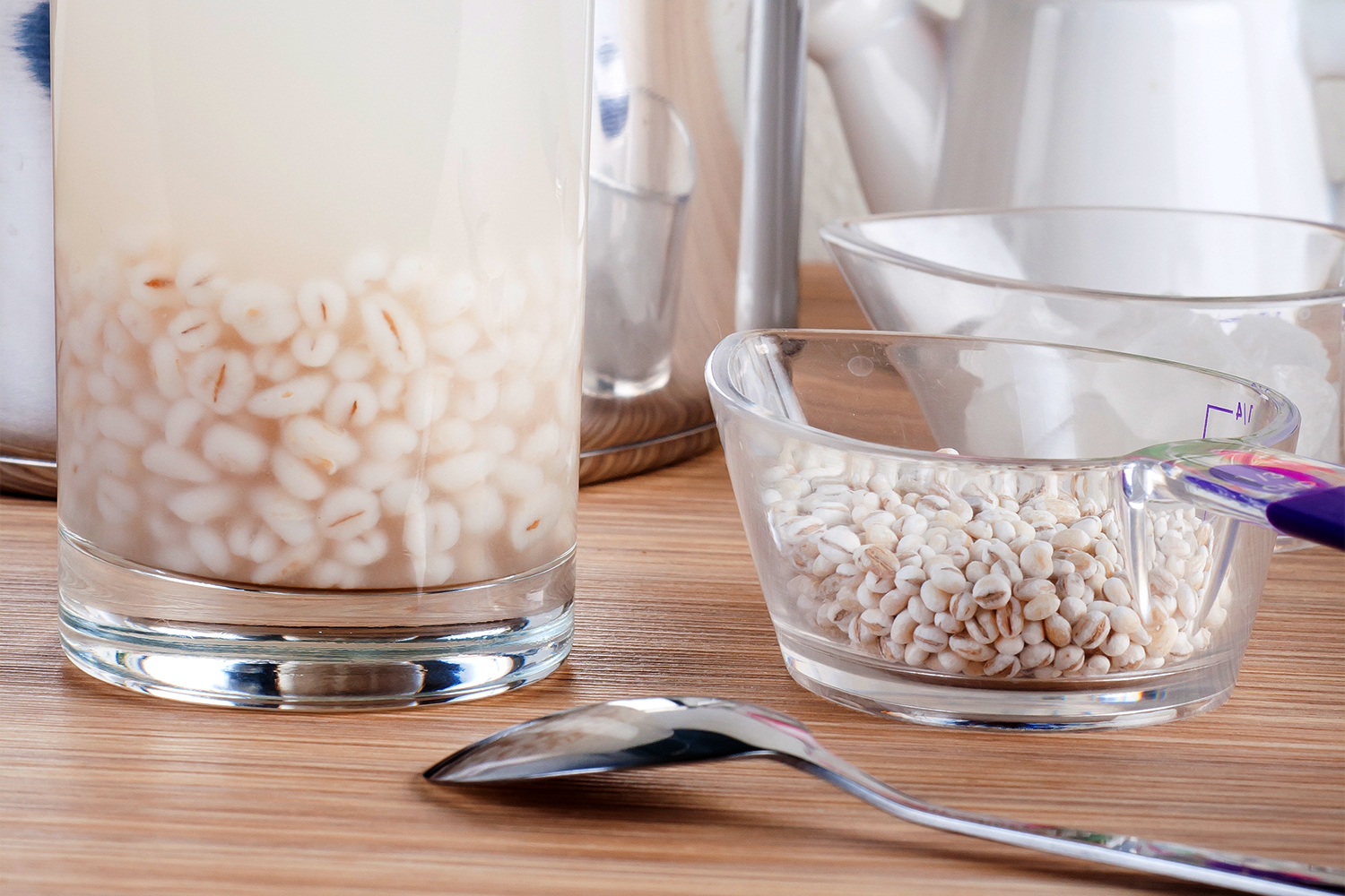 Discover the Benefits of Barley Water A glass of barley soaking in hot water