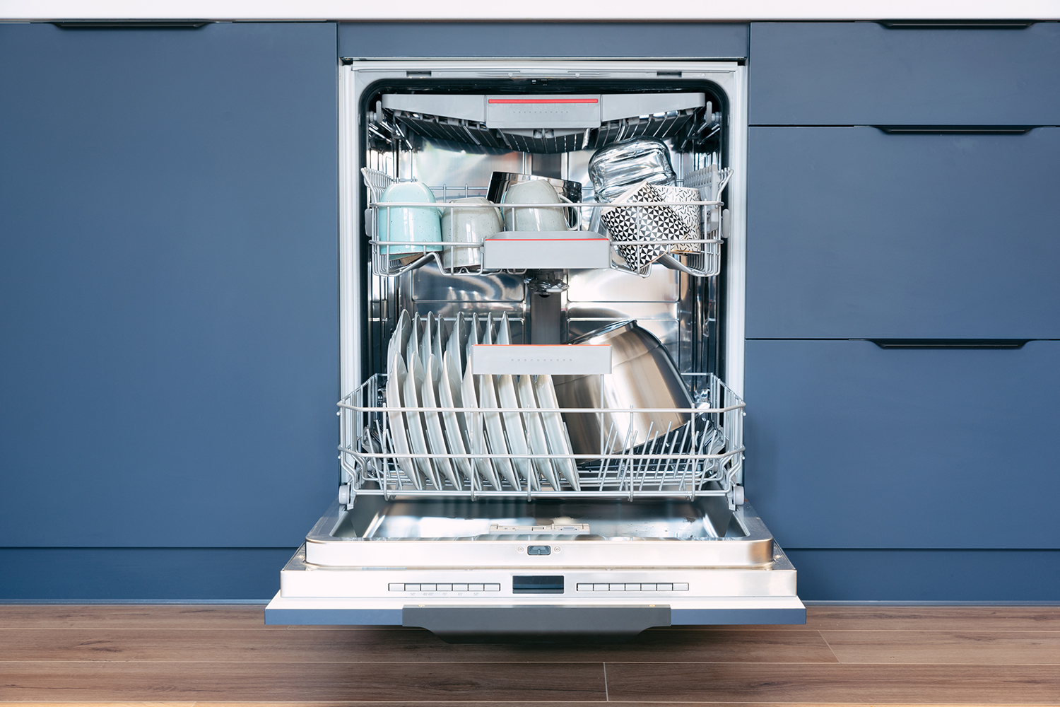 Dropps UltraWash Plus Biobased Power Dishwasher Detergent a dishwasher full of spotless bowls and plates