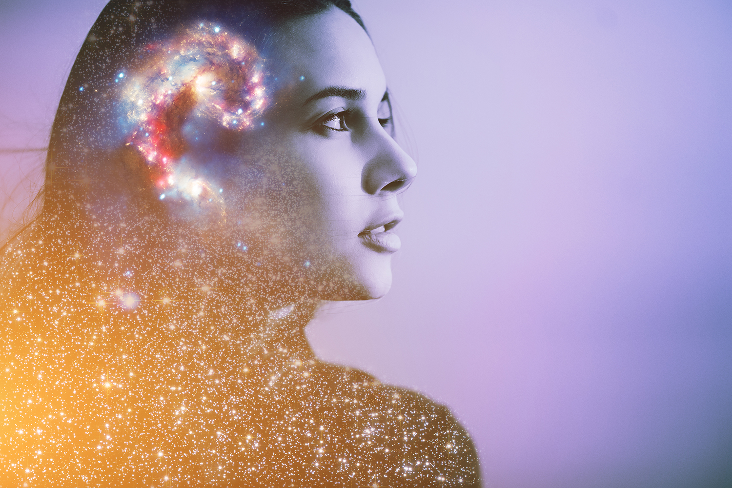 a peaceful woman with a galaxy and cosmos in her mind