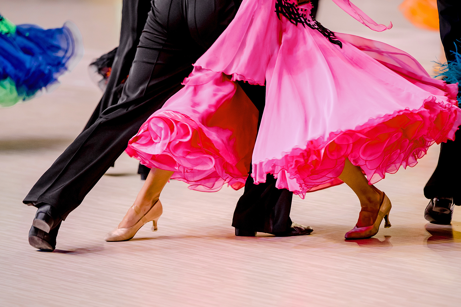 an older couple ballroom dancing