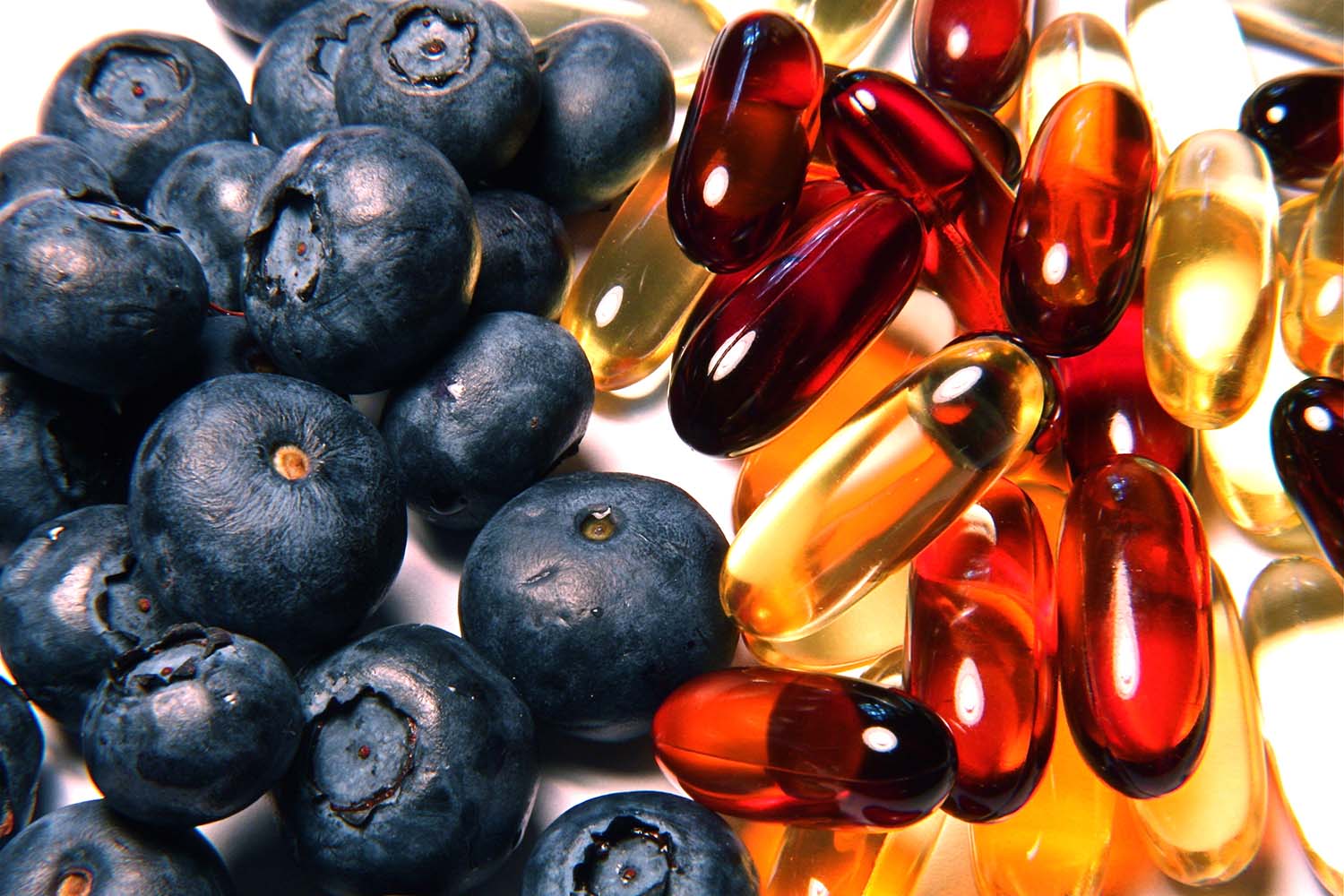 fresh blueberries and gelcap supplements