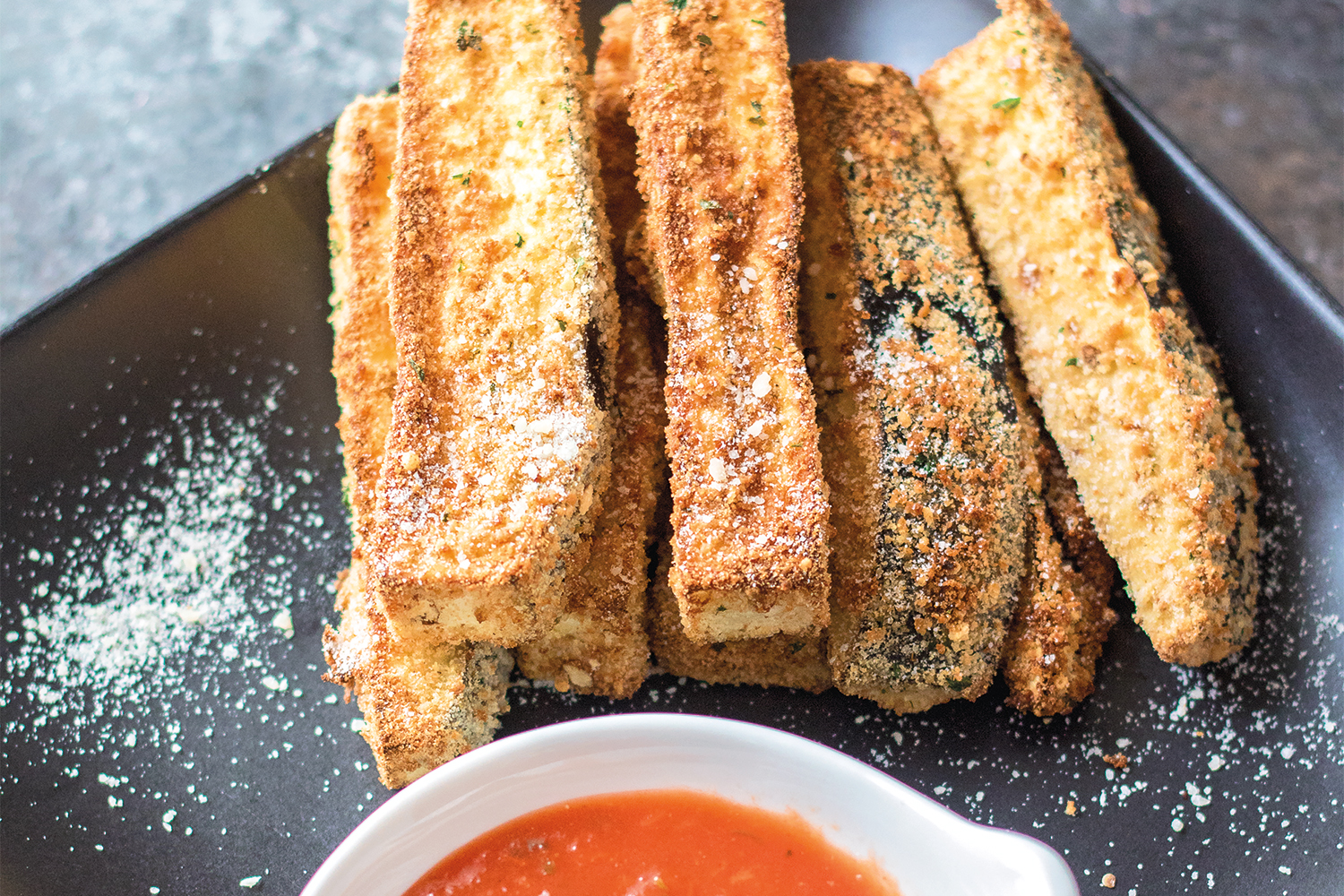Eggplant Fries with Marinara a plate of eggplant fries with marinara for dipping