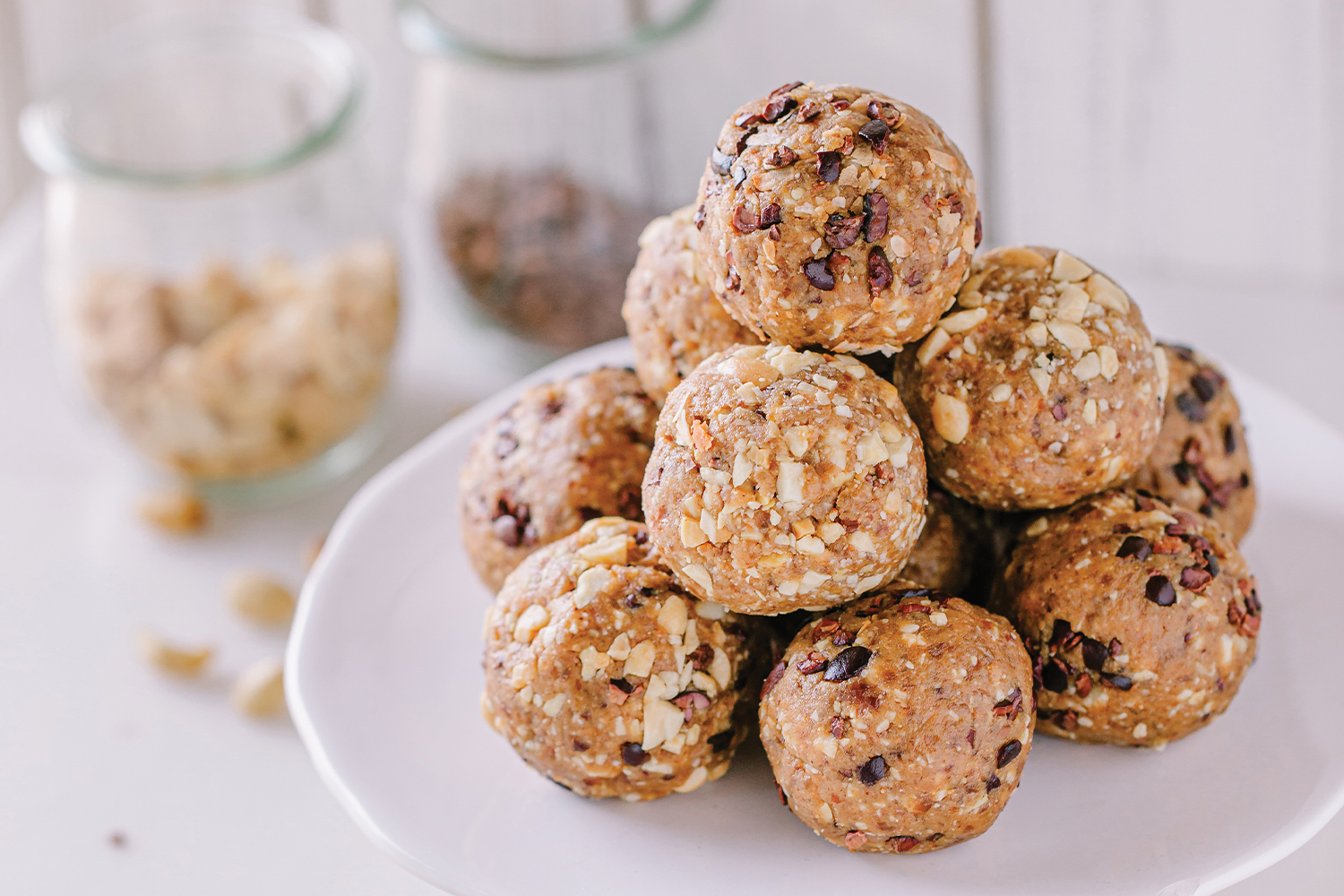 Peanut Butter Crunch Balls Peanut Butter Crunch Balls on a white plate.