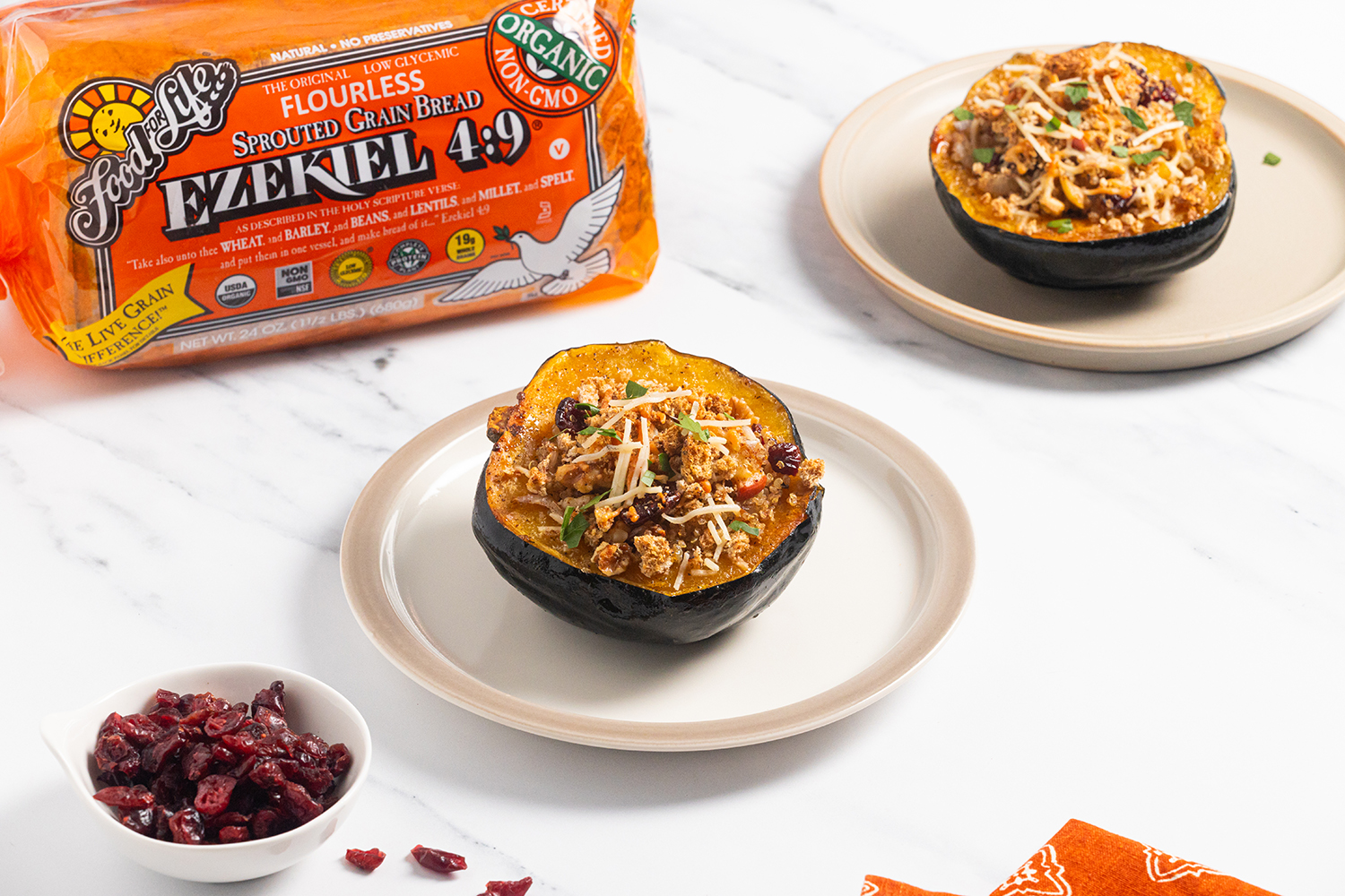 Stuffed Acorn Squash two halves of a stuffed acorn squash