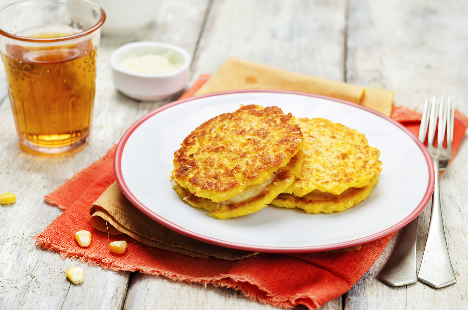 Fresh Corn Pancakes with Lime Drizzle Freshly made corn pancakes.