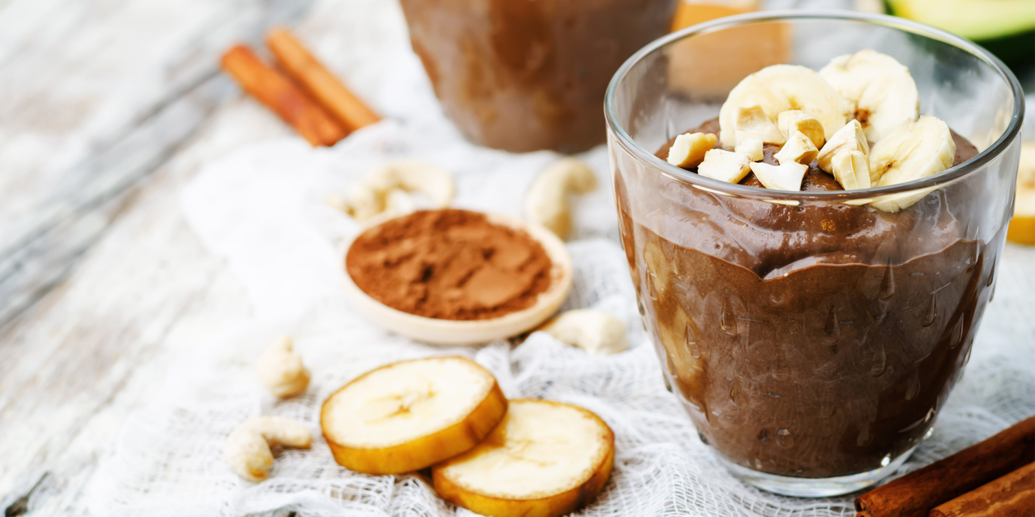 Chocolate Banana Pudding Chocolate and Banana Pudding in a glass dessert cup.