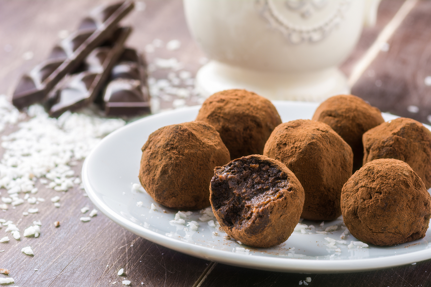 A plate of dark chocolate truffles