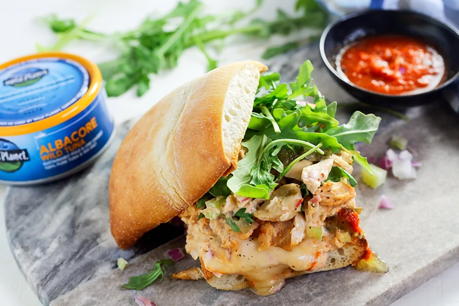 Sriracha Tuna Melts a tuna sandwich with cheese and spicy sauce