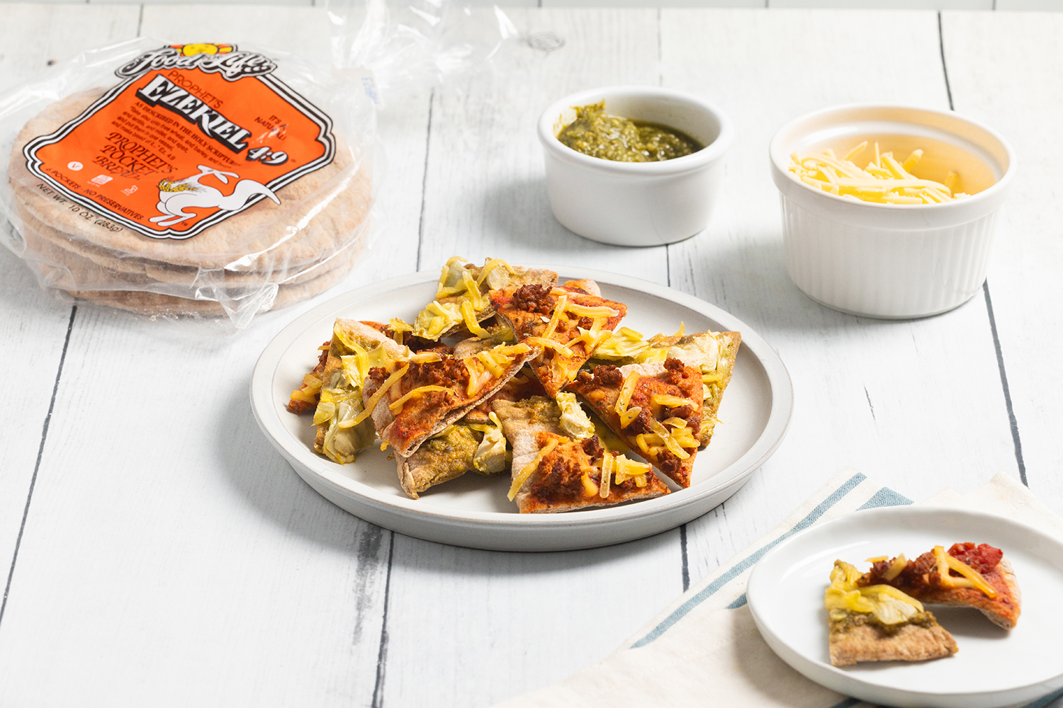 Baked Pizza Pita Bites 2 Ways a palte of pizza bites made on pocket bread