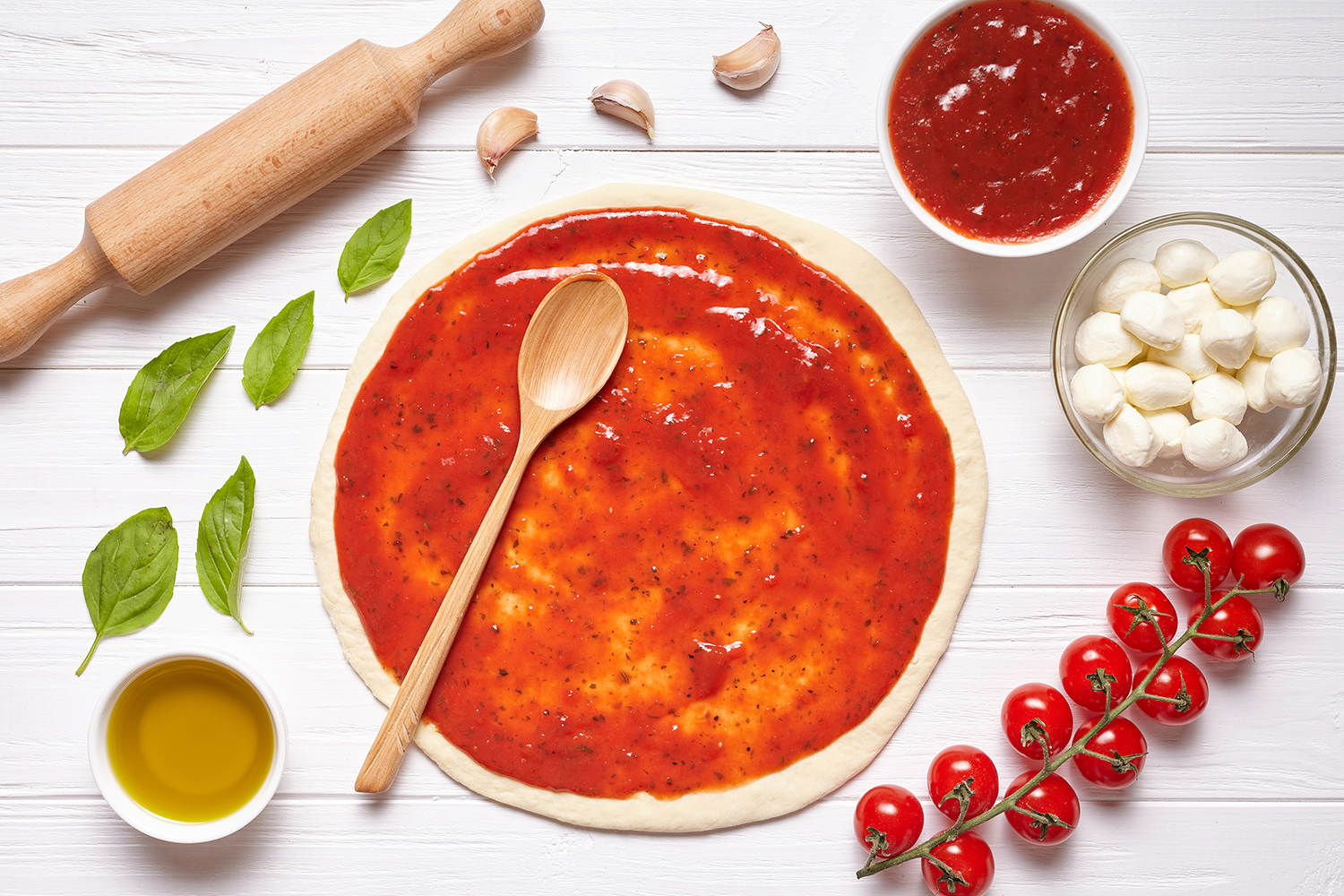 Pizza Sauce pizza sauce spread on a crust
