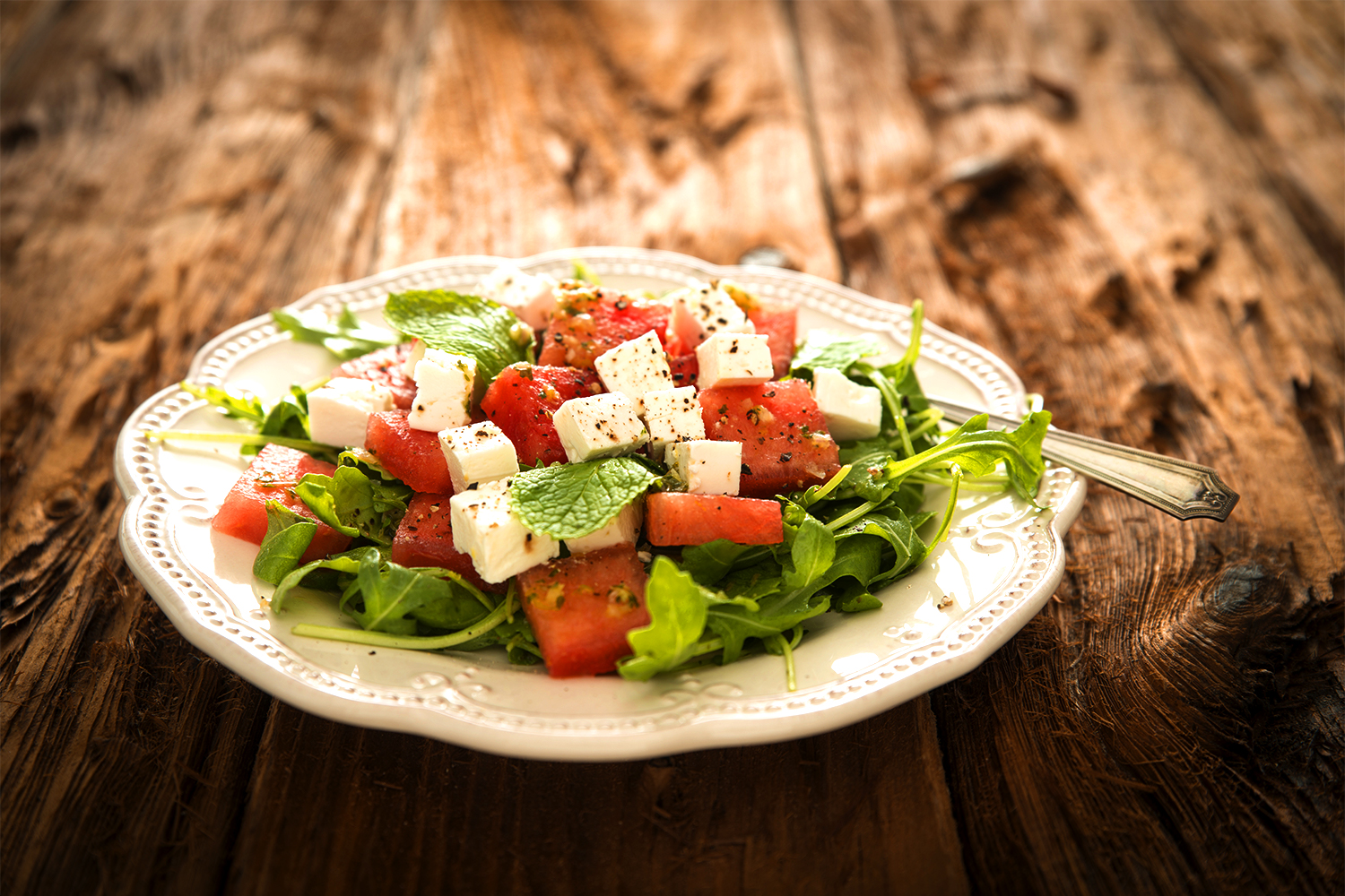 Savory and Sweet Summer Herb and Fruit Salad A mmix of watermelon, arugula, and feta cheese