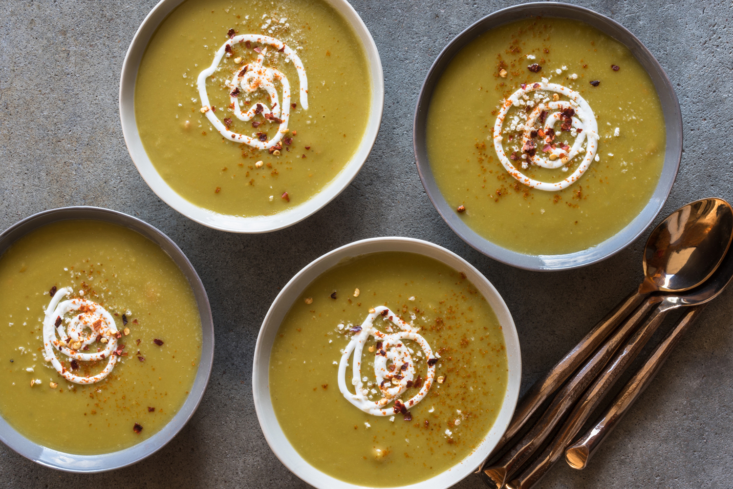 Split Pea Soup Four bowls of garnished Split Pea Soup.