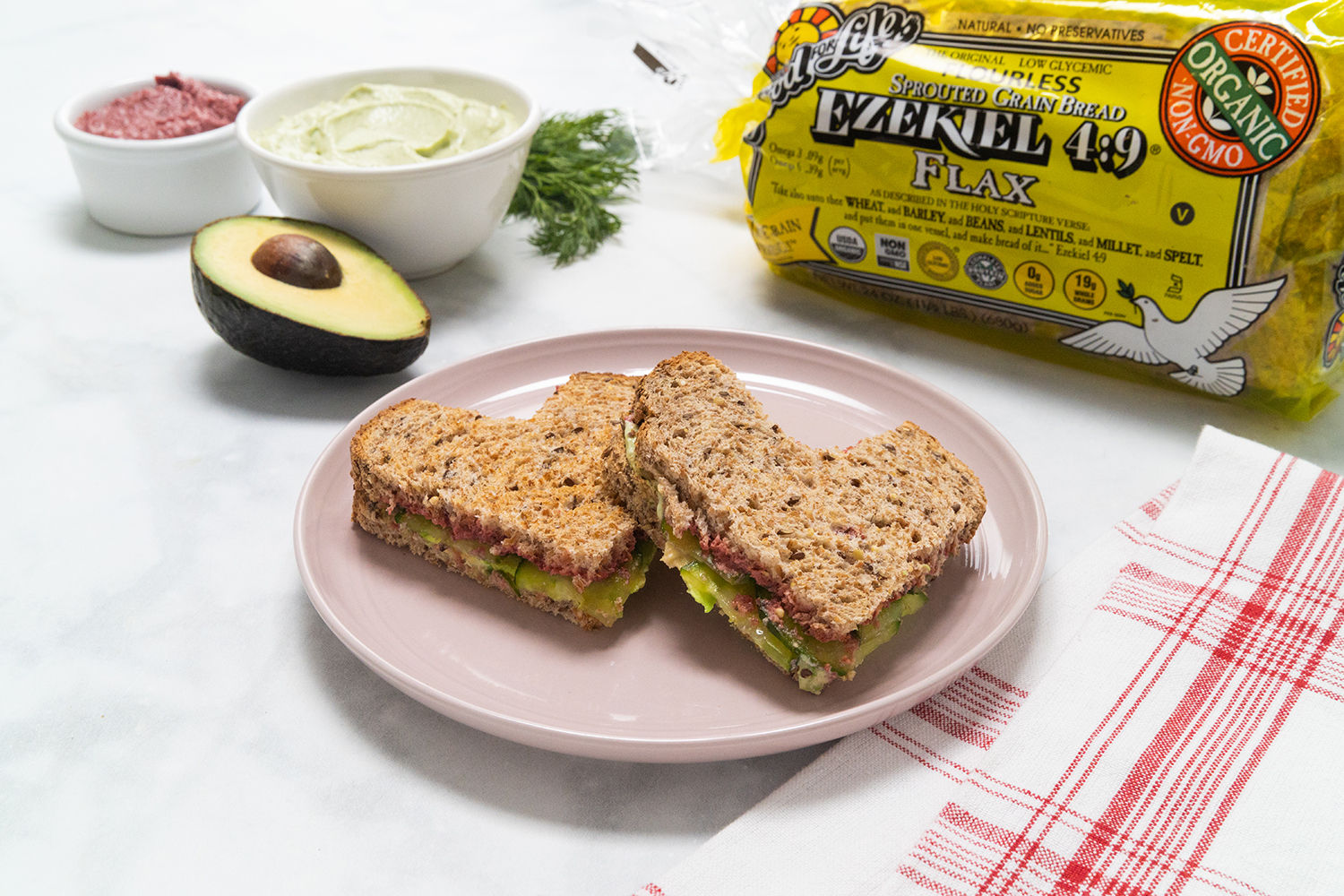 Beet Tea Sandwiches with Dilly Tofu Cream Cheese a sandwich with beets, avocado, and dill cheese spread