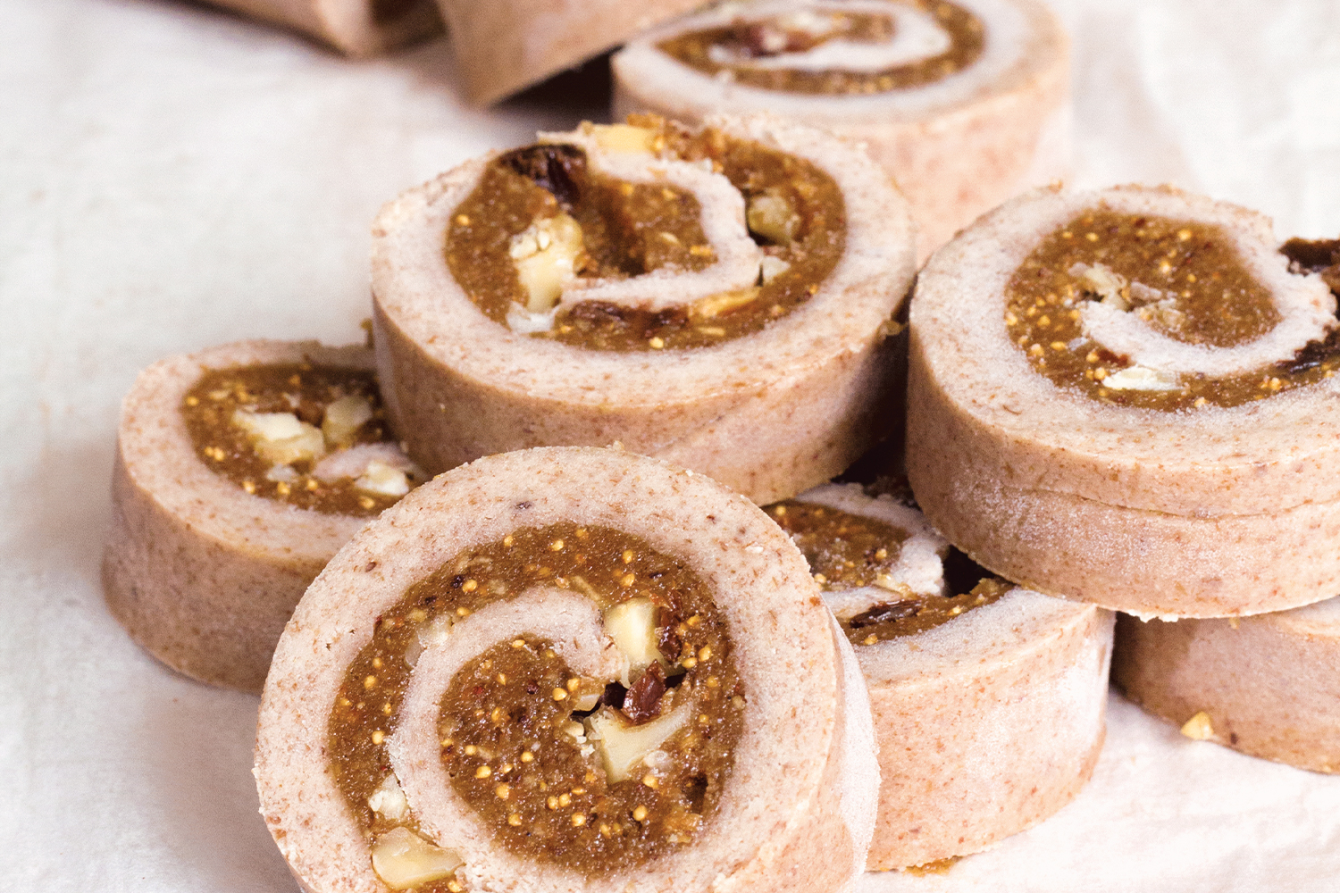 Raw Cinnamon Rolls slices of raw cinnamon roll on a tea towel