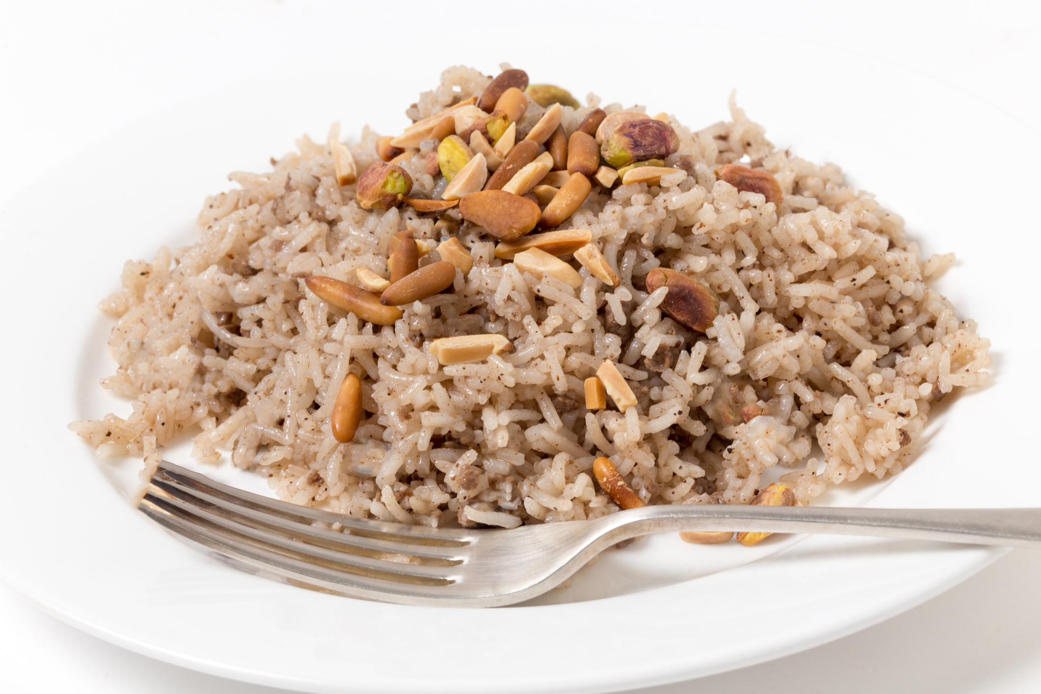 Spiced Rice with Toasted Almonds a plate of seasoned rice with almonds