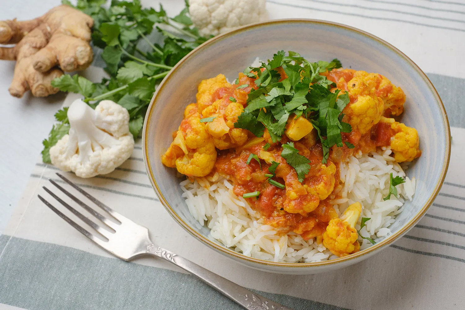 Keto Cauliflower Curry a bowl of cauliflower curry on rice