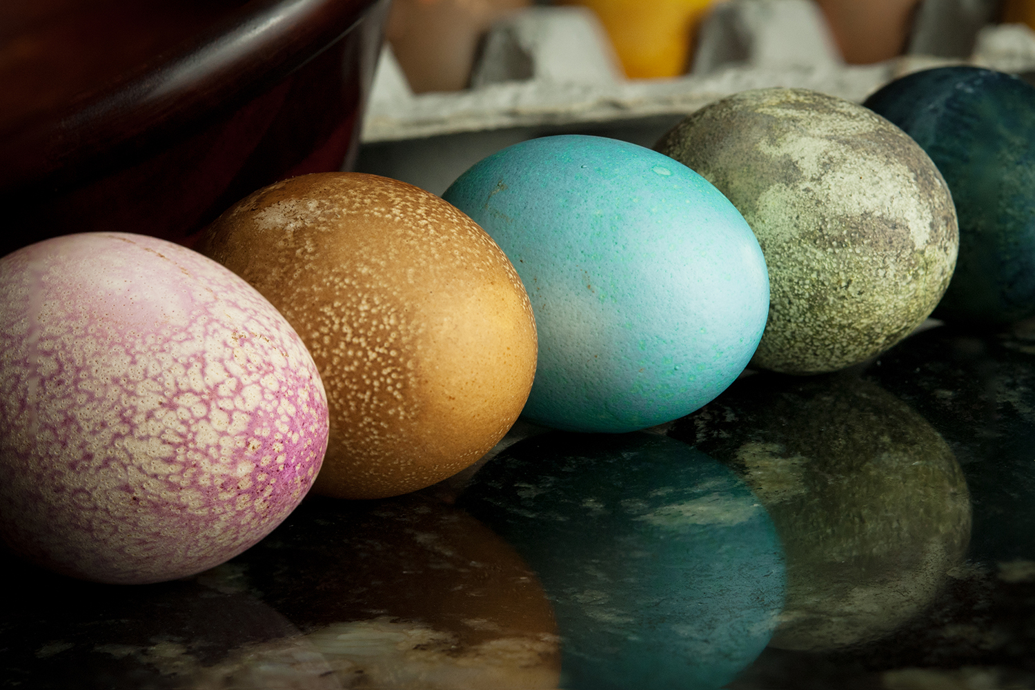 a variety of naturally dyed easter eggs