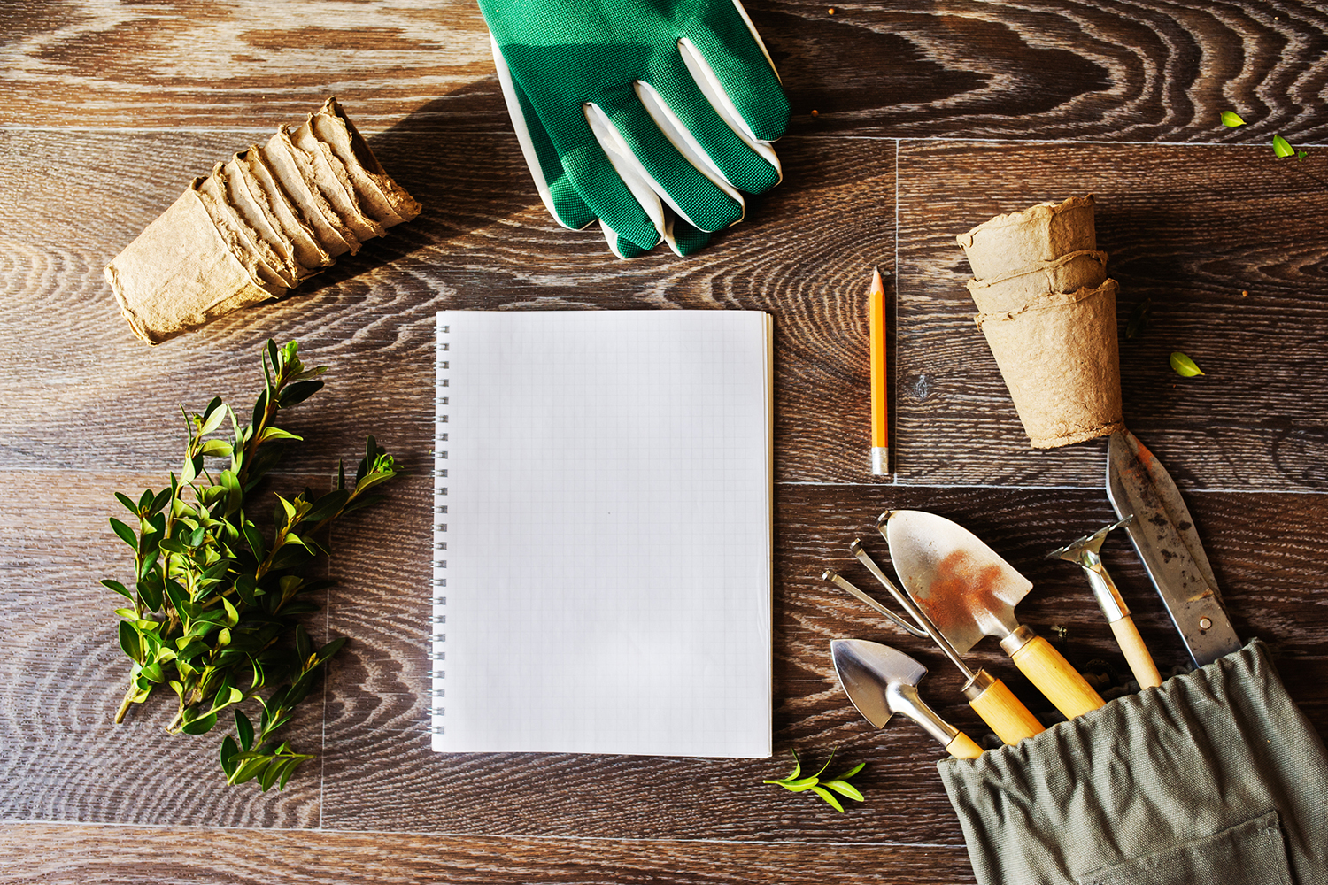 gardening tools and a notebook