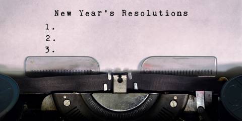 New year`s resolutions typed on a vintage typewriter.