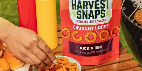 a bowl of baked red lentil snacks