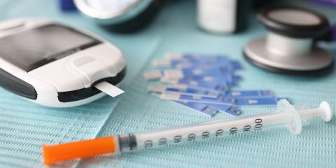 Fighting Diabetes Naturally a diabetes testing strip and syringe