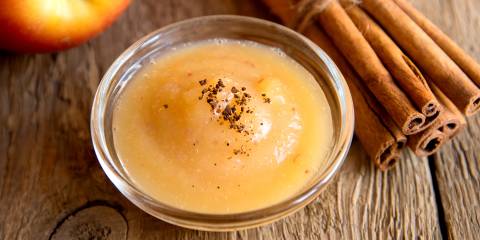 A bowl of fresh applesauce with cinnamon