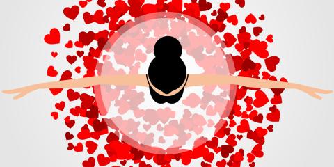 Ballerina dances with hearts