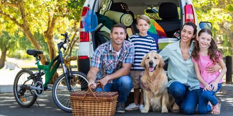 a young family packed up for a road trip