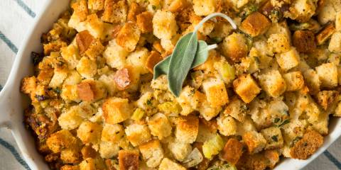 Gluten-Free Pear and Pecan Stuffing a baking dish full of gluten-free stuffing with nuts and fruit