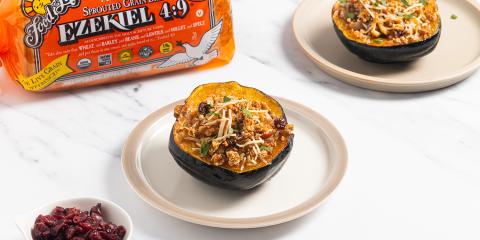 Stuffed Acorn Squash two halves of a stuffed acorn squash