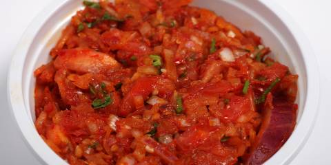 Sun-Dried Tomato Dip a bowl of blended tomatoes, shallot, and peppers