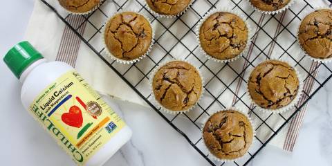 fresh-baked gluten-free muffins and a bottle of liquid calcium