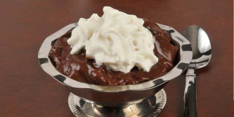 Chocolate-Raspberry Pots de Crème Chocolate custard with whipped cream