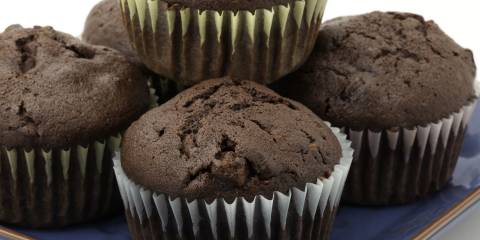 Chocolate Zucchini Cupcakes A plate of chocolate cupcakes in paper cups