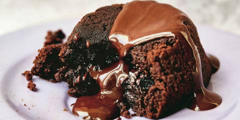 Extra-Chocolate Lava Cakes a cake oozing with chocolate