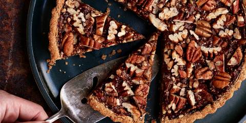 Pumpkin Pecan Tart  Pumpkin Pecan Tart being sliced and served.