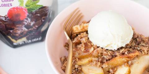 Spiced Apple Crisp a bowl of apple crisp topped with vanilla ice cream