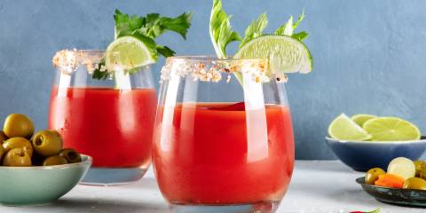 two glasses of non-alcholic bloody mary with garnish