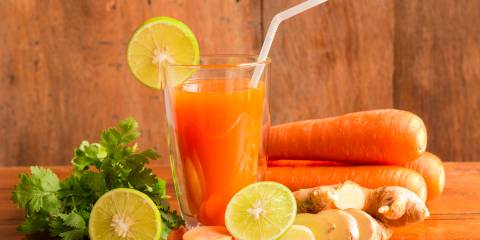 Carrot Coriander Ginger Cocktail with ingredients.