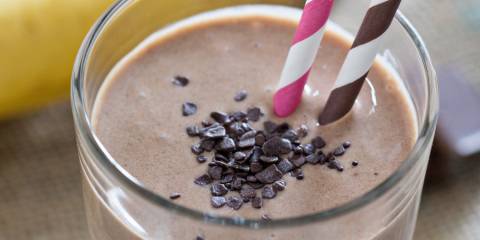 Chocolate Smoothie a superfood smoothie in a glass with chocolate chips