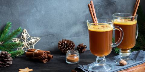Hot Buttered Rum Hot buttered rum cocktail with cinnamon for winter holidays and colds.