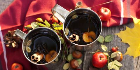 Warm Apple Tea hot mugs of red tea with apple and cinnamon