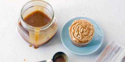 a gluten-free cupcake and a jar of caramel