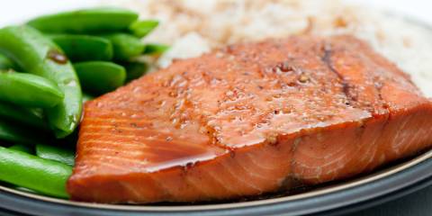 Miso-Glazed Salmon a baked salmon with soy-based glaze, served with snap peas and white rice