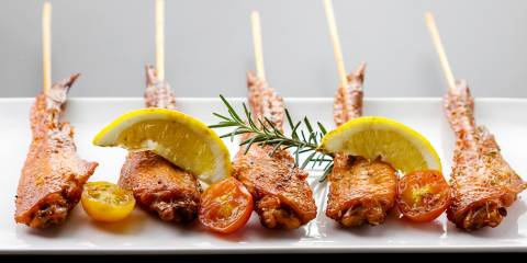 chicken skewers with peppers, rosemary, and lemon