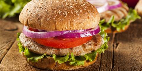 Spicy Turkey Burger a homemade turkey-meat patty with lettuce, tomato, and onion