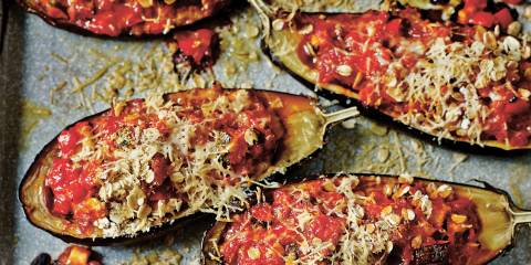 Stuffed eggplant on a baking sheet.