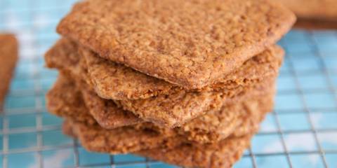 Graham Cracker Goodness Graham crackers cookies places on a cooling rack.