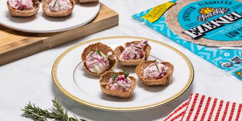 Mini Rosemary and Cranberry Goat Cheese Bites goat cheese with cranberries on tortilla chips